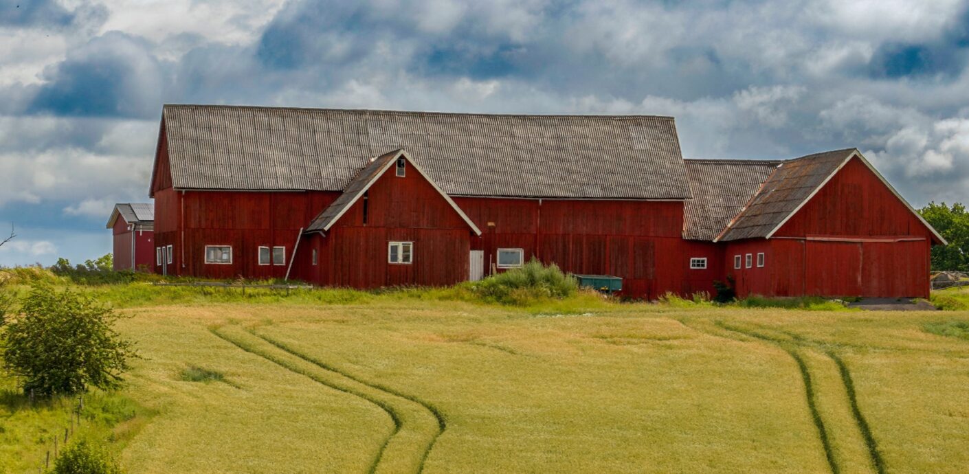 Outbuildings on a rural home that an appraiser must describe and analyze