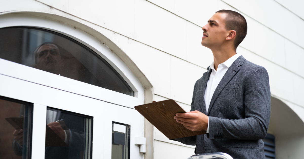 Real estate appraiser working alone in a home symbolic of isolation in the appraisal profession