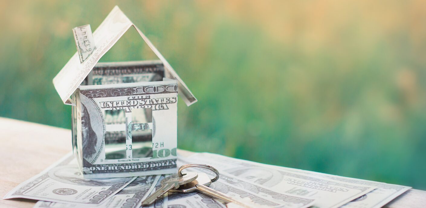 House made of dollar bills representing Chicago home appraisal value and loan approval rates