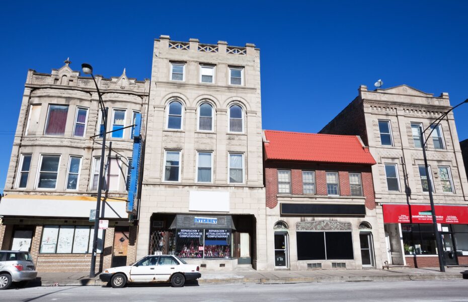 Chicago mixed-use three-flat with commercial space showcasing residential and commercial market trends for November 2025.