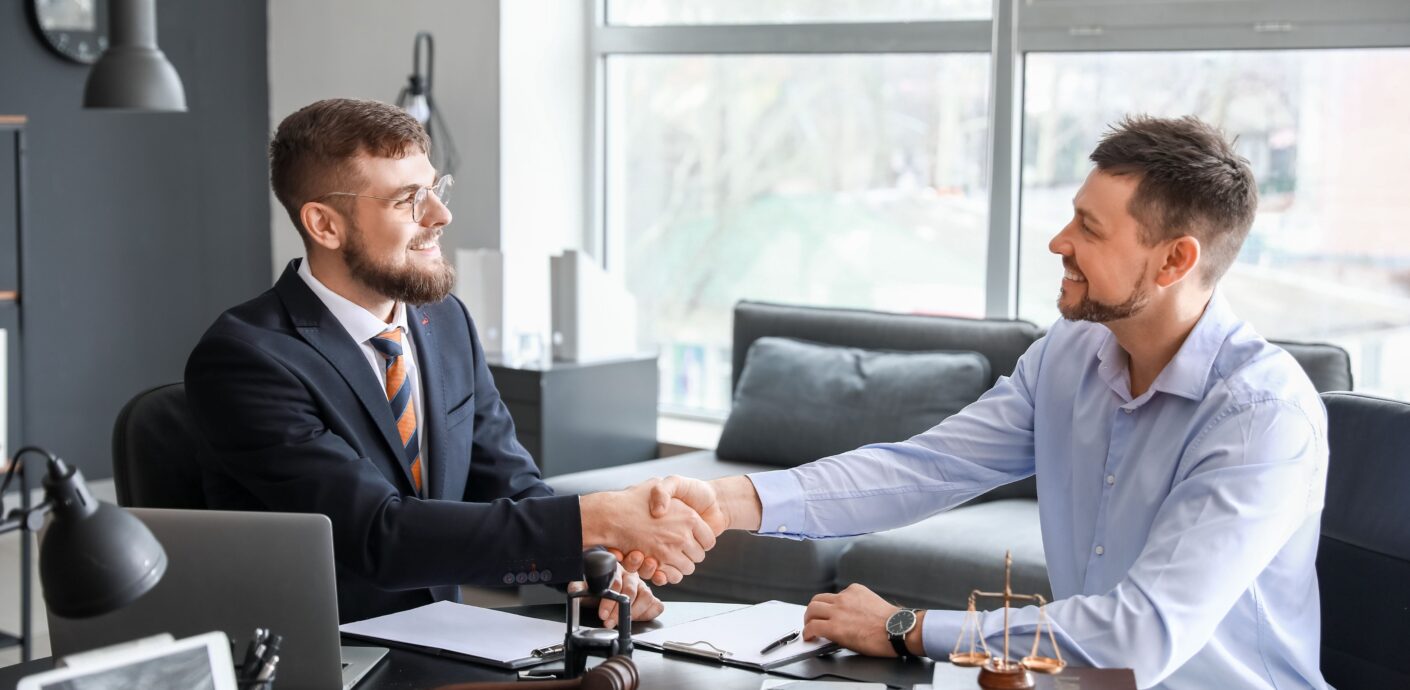 Attorney and commercial appraiser reviewing a litigation-ready commercial appraisal report.