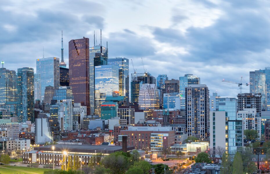 Cityscape Overview With Office Buildings And Residential Homes Background