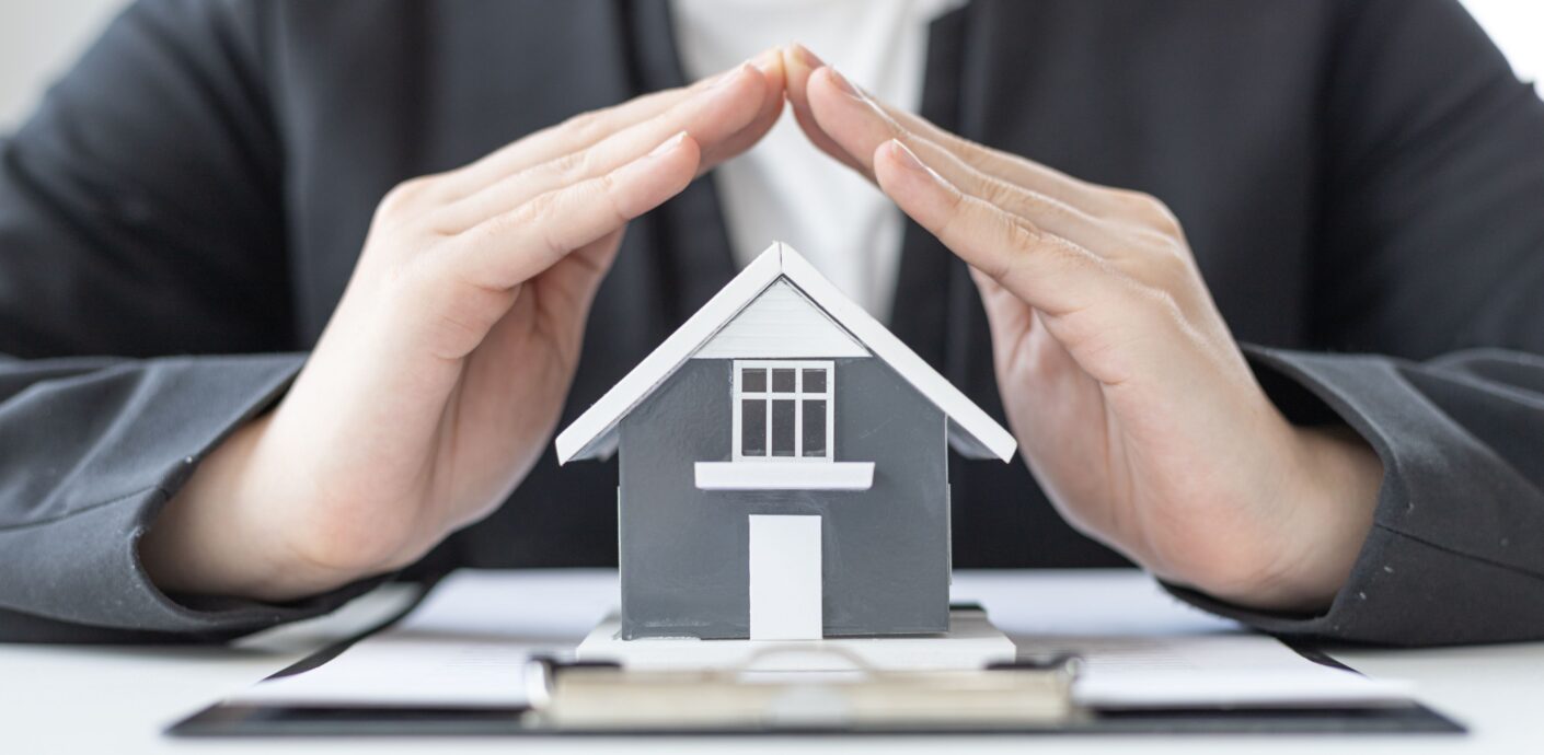 Certified USPAP appraisal report for Chicago probate estate settlement. Hand protecting a property