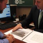 Lender reviewing an SBA appraisal report for a 7(a) loan on an owner-occupied commercial building