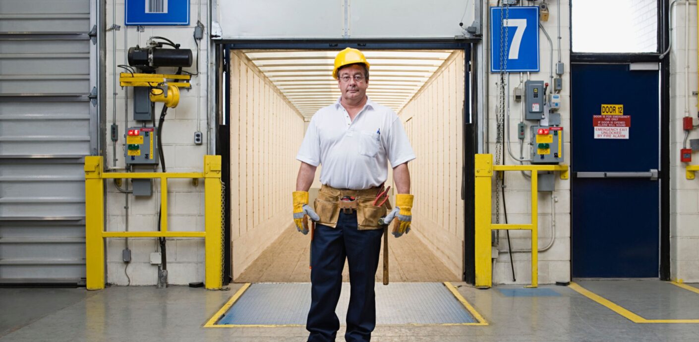 Business owner in the loading bay of the light industrial building her company occupies, the subject of an owner-occupied appraisal