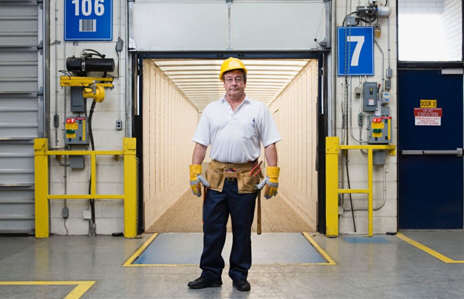 Business owner in the loading bay of the light industrial building her company occupies, the subject of an owner-occupied appraisal